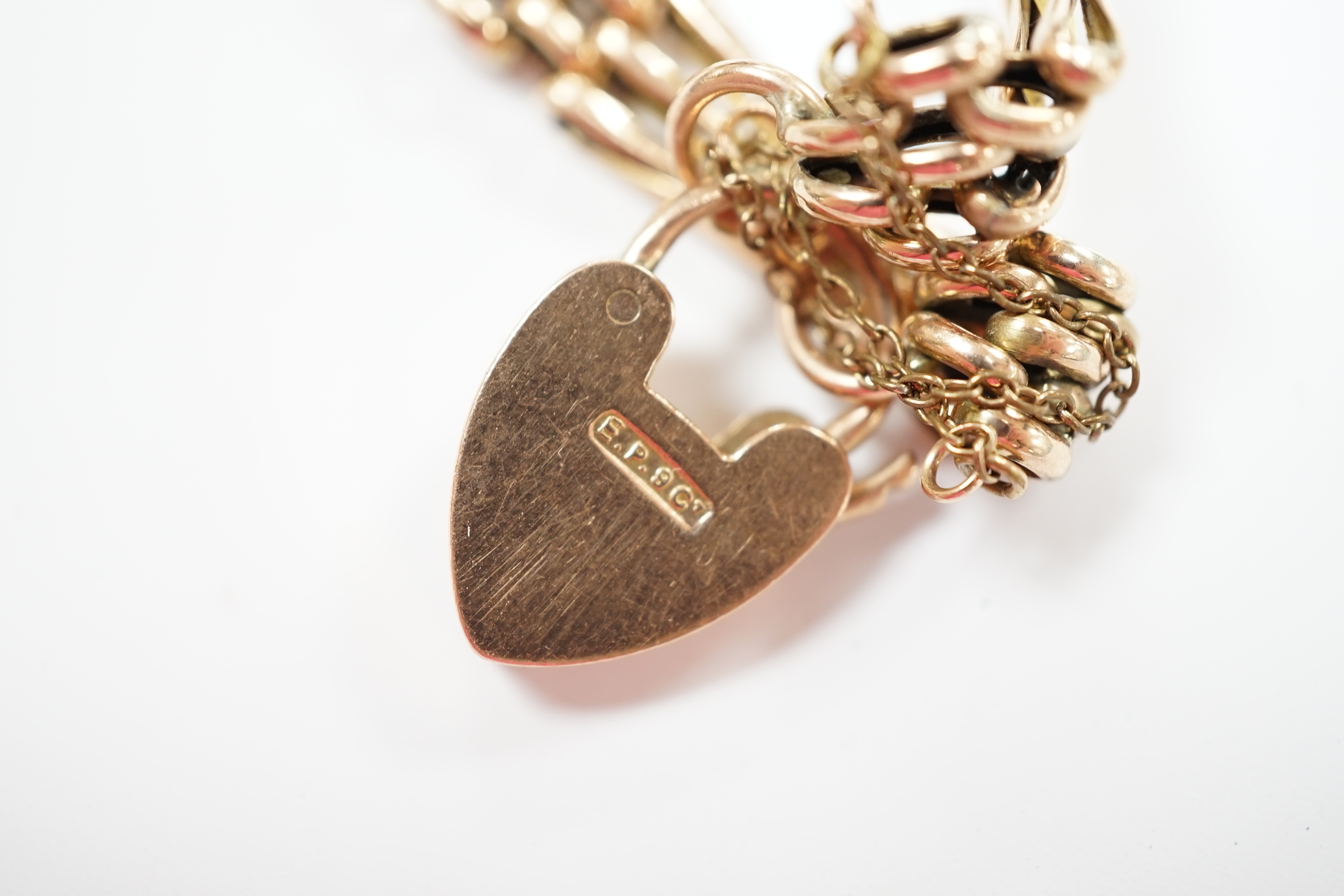 A 9ct gate link bracelet, with heart shaped padlock clasp, 18cm, 10.3 grams.
